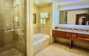 Combined shower/bathtub, hair dryer, towels, soap