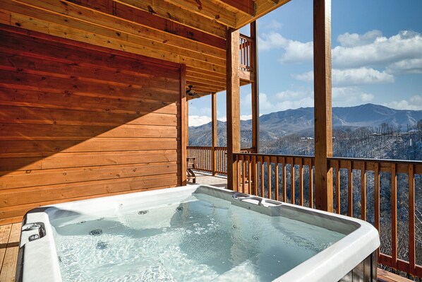 Relax on the balcony with a hot tub overlooking the mountains.