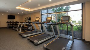 A gym with treadmills, weights, and a large window. - Residence Inn by Marriott Nashville Mt. Juliet (Mount Juliet)