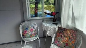 Deluxe Cottage | Living area - Village Homestay (Kumphawapi)
