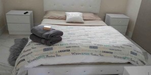 1 dormitorio, tabla de planchar con plancha, wifi gratis y ropa de cama
