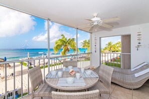 Outdoor dining - Seven Mile Beachfront Condo at Discovery Point (George Town)