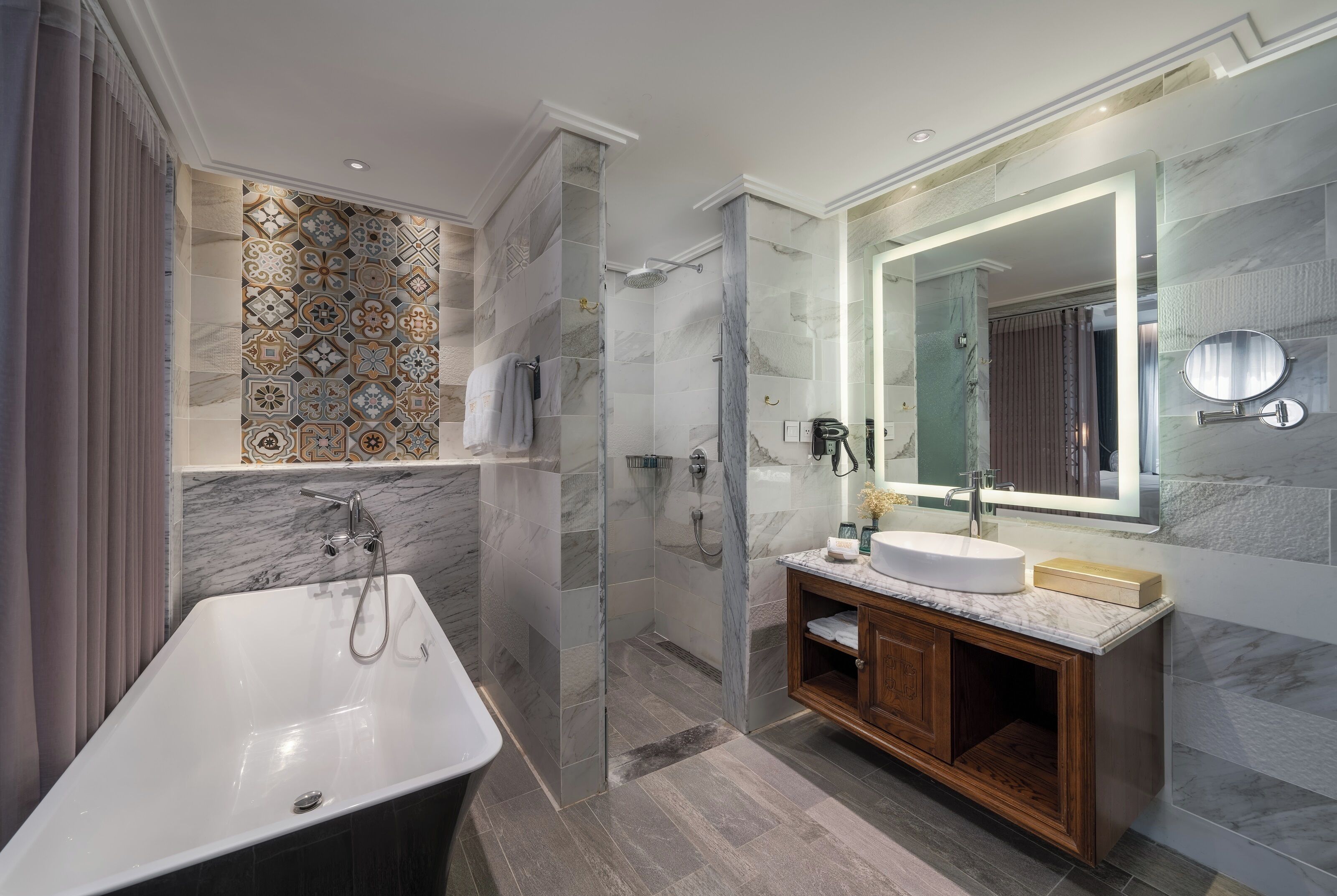 luxury suite | bathroom | separate bathtub and shower, deep-soaking bathtub, rainfall showerhead
