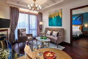 Grand Suite | Living room | 43-inch Smart TV with cable channels, TV - Peridot Grand Luxury Boutique Hotel (Hanoi)
