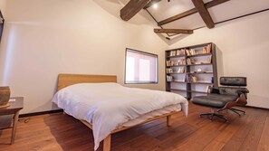 Desk, laptop workspace, bed sheets