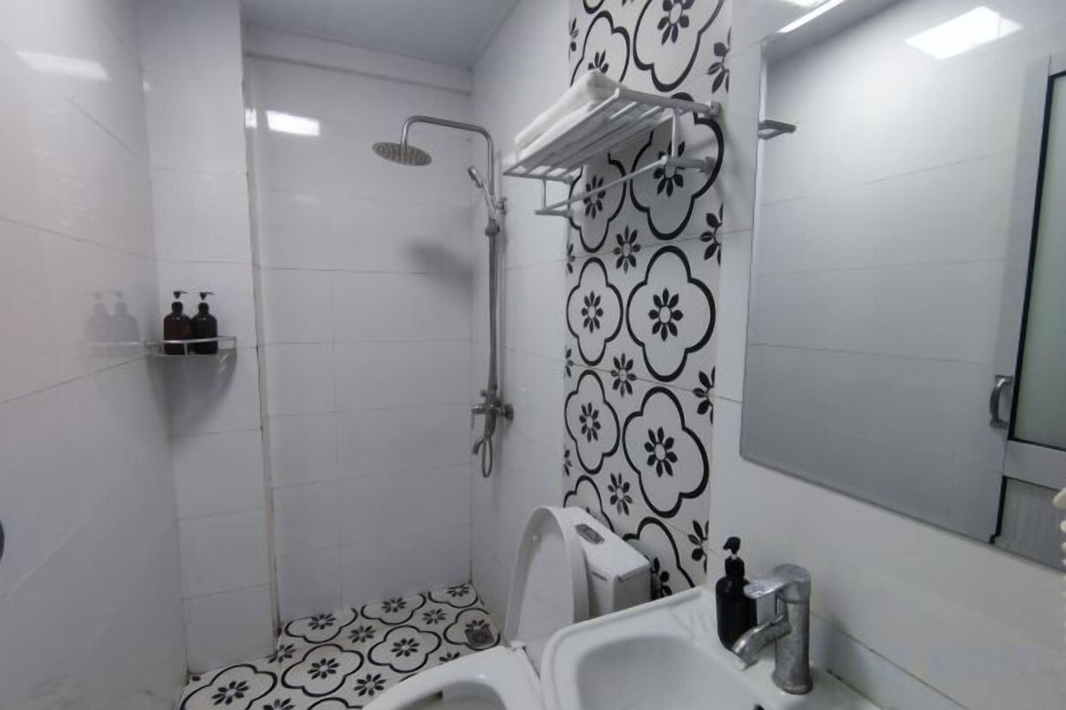 Bathroom | Shower, free toiletries, hair dryer, slippers
