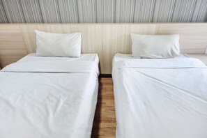 Standaard Twin kamer | Een bureau, gratis wifi, beddengoed