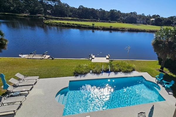 Backyard with new pool surround (Oct. 2025) and pool resurfaced (Feb. 2025)