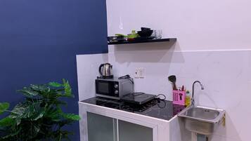 Quarto elite, 1 quarto | Frigobar, escrivaninha, espaço de trabalho para notebook