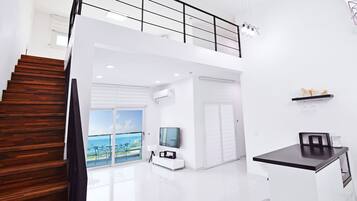 Duplex A Spa (Spa 20,000 KRW per room, Pay on site - Americano for 2) | Living area | Flat-screen TV, heated floors