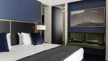 Ropa de cama de alta calidad, colchones con acolchado adicional, minibar