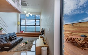 Duplex, Jetted Tub (401) | Living area | LED TV