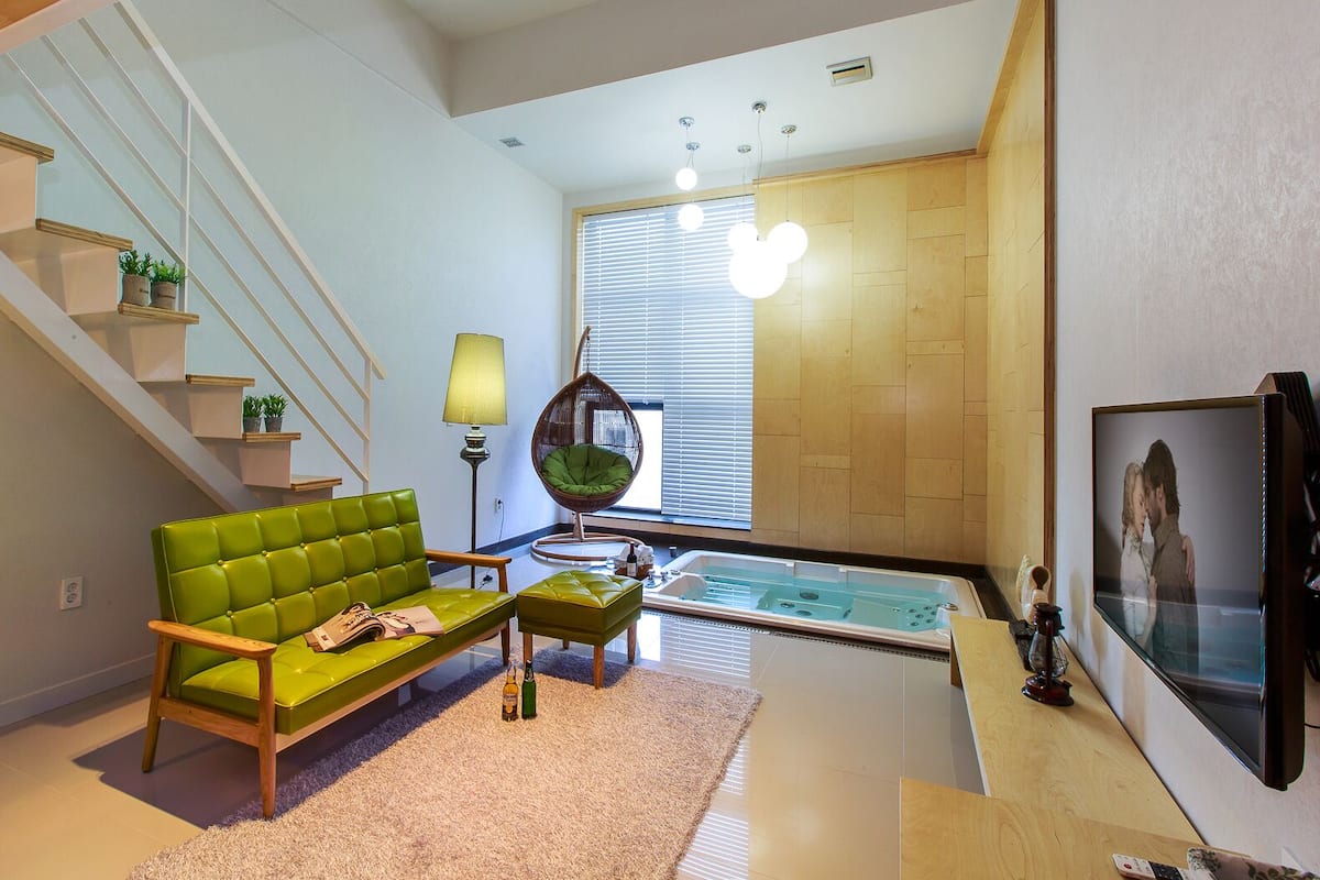 Duplex, Jetted Tub (201) | Living area | LED TV