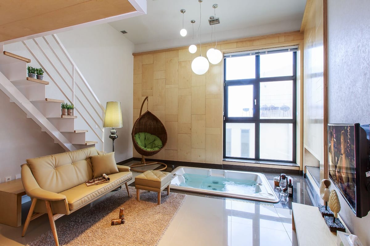Duplex, Jetted Tub (203) | Living area | LED TV