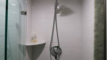 Bathtub, hair dryer, towels, soap