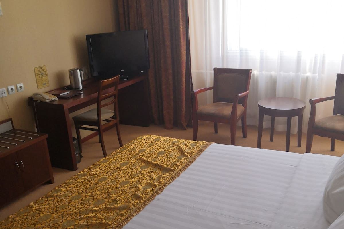 Comfort Double Room | Minibar, desk, laptop workspace, iron/ironing board