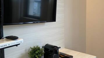 Egyptian cotton sheets, premium bedding, down duvets, minibar