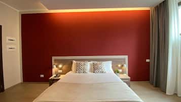 Egyptian cotton sheets, premium bedding, down duvets, minibar