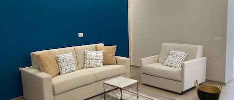 Suite exclusiva | Área de sala de estar | Televisión LCD y películas de estreno