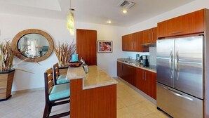 Stovetop, dishwasher, cookware/dishes/utensils - Condo Ouana (Lowlands)