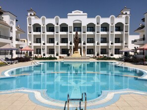 Outdoor pool, pool umbrellas, pool loungers