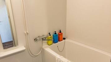 Quadruple Room, Bathtub (Q) | Bathroom | Separate tub and shower, free toiletries, hair dryer, slippers
