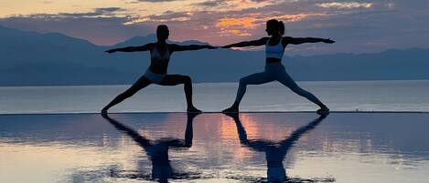 Seasonal outdoor pool, open 10:00 AM to 7:00 PM, pool umbrellas