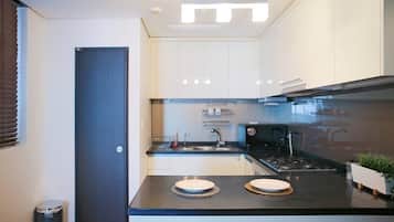 Fridge, microwave, cookware/dishes/utensils, spices