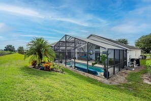 A heated pool, pool loungers