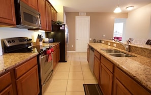 Condo | Private kitchen | Fridge, microwave, oven, stovetop