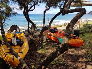 On the beach, sun loungers, beach towels