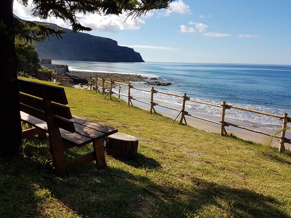 On the beach, sun loungers, beach towels