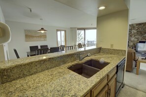 Condo, 2 Bedrooms | Private kitchen | Fridge, oven, coffee/tea maker, electric kettle