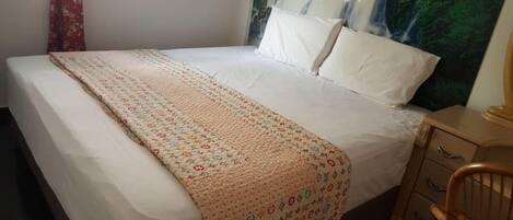 Blackout curtains, iron/ironing board, bed sheets