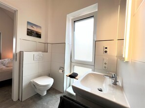 Douche, sèche-cheveux