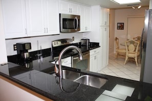 Condo | Private kitchen | Fridge, microwave, oven, stovetop - The Anna Maria Island Beach Sands 201 (Bradenton Beach)
