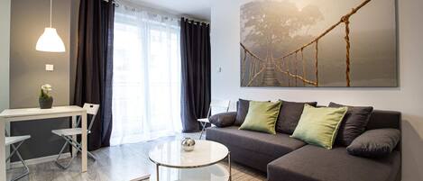 Superior Apartment | Living room | 30-inch flat-screen TV with cable channels, TV