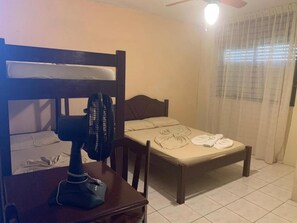 Minibar, desk, bed sheets