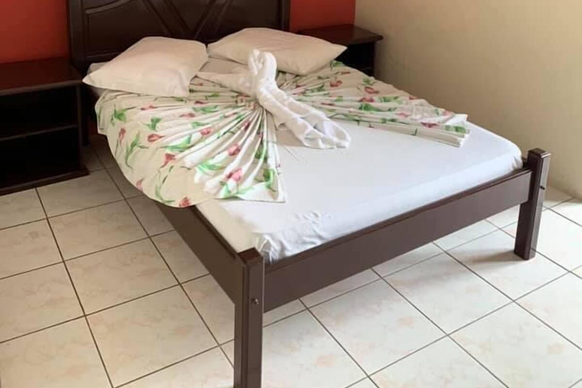 Minibar, desk, bed sheets