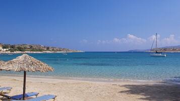 On the beach, white sand, 2 beach bars