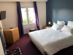 Desk, blackout drapes, soundproofing, free WiFi