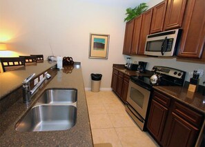 Apartment | Private kitchen | Fridge, microwave, oven, stovetop