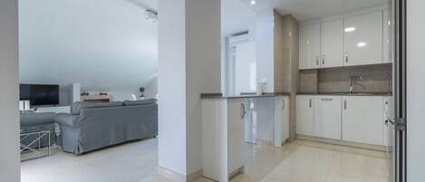 Castillo Ático Panorama | Private kitchen | Full-size fridge, microwave, oven, stovetop