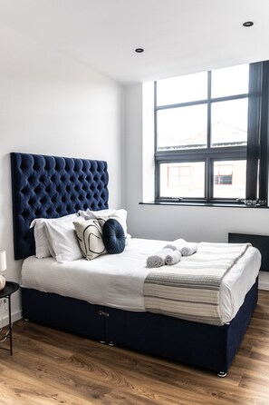 Elite Apartment | Memory foam beds, soundproofing, iron/ironing board, travel crib - Spire Accommodations Ltd. (Bradford)