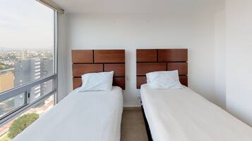 Departamento panorámico | 2 habitaciones, cortinas blackout y tabla de planchar con plancha