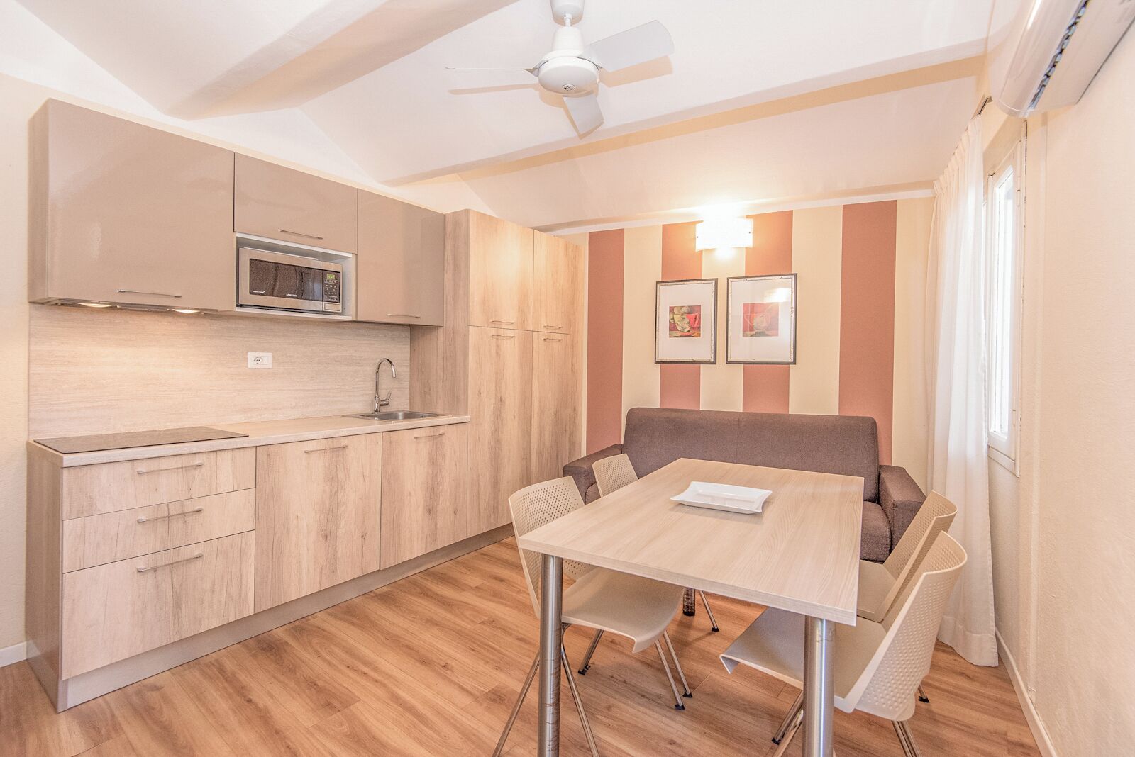 Villa Comfort | Private kitchen | Full-size fridge, stovetop, cookware/dishes/utensils, dining tables