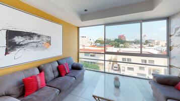 Departamento Deluxe | Sala de estar | Televisión LED