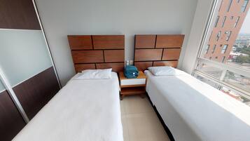 Departamento Elite | 3 habitaciones, cortinas blackout y tabla de planchar con plancha