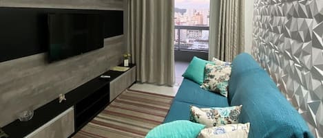 55-inch Smart TV with satellite channels, TV, Netflix