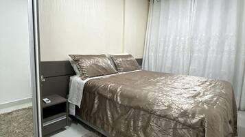 1 quarto, roupas de cama premium, camas com colchões pillow-top